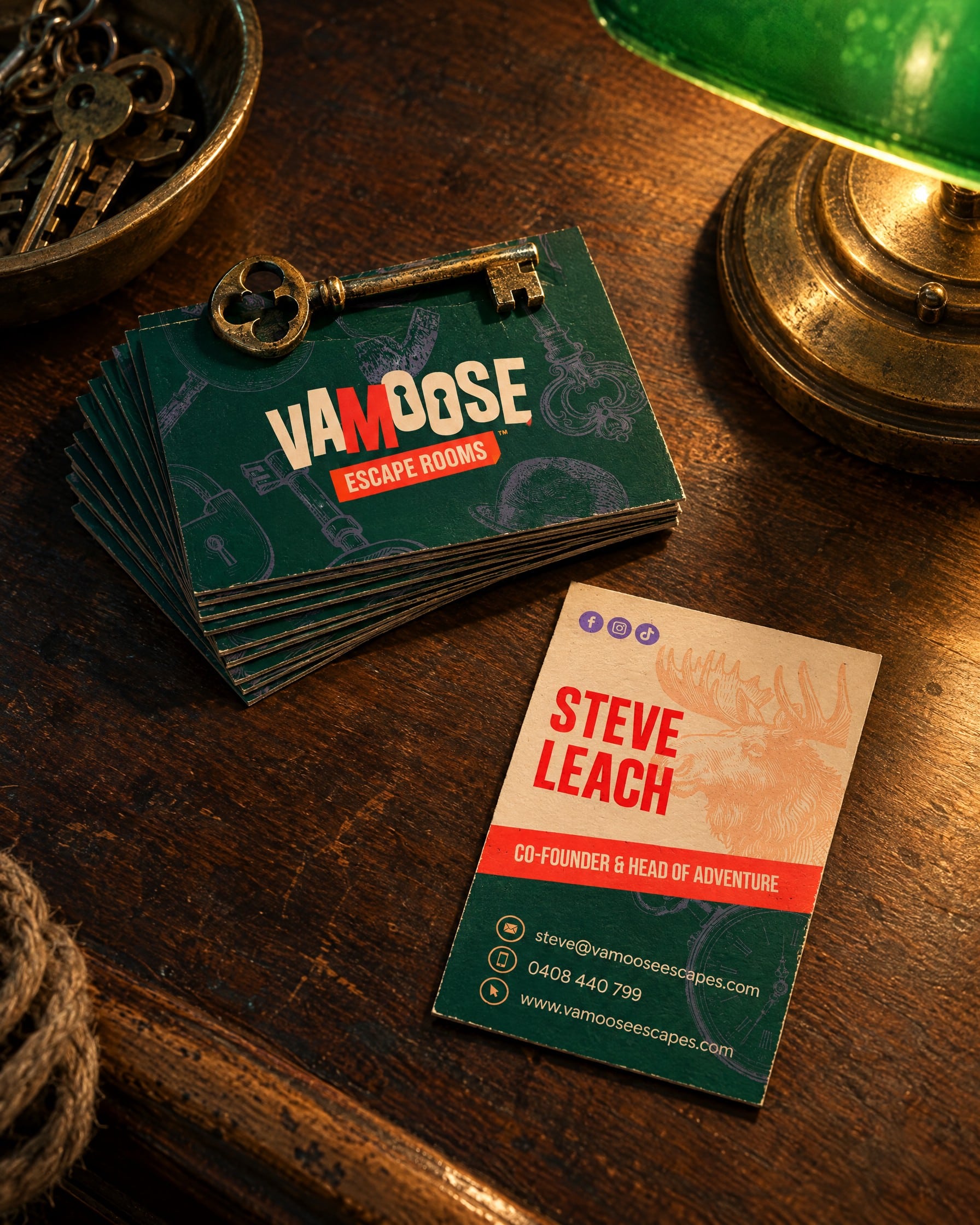 Vamoose Escape Rooms Business Cards On Desk Mockup