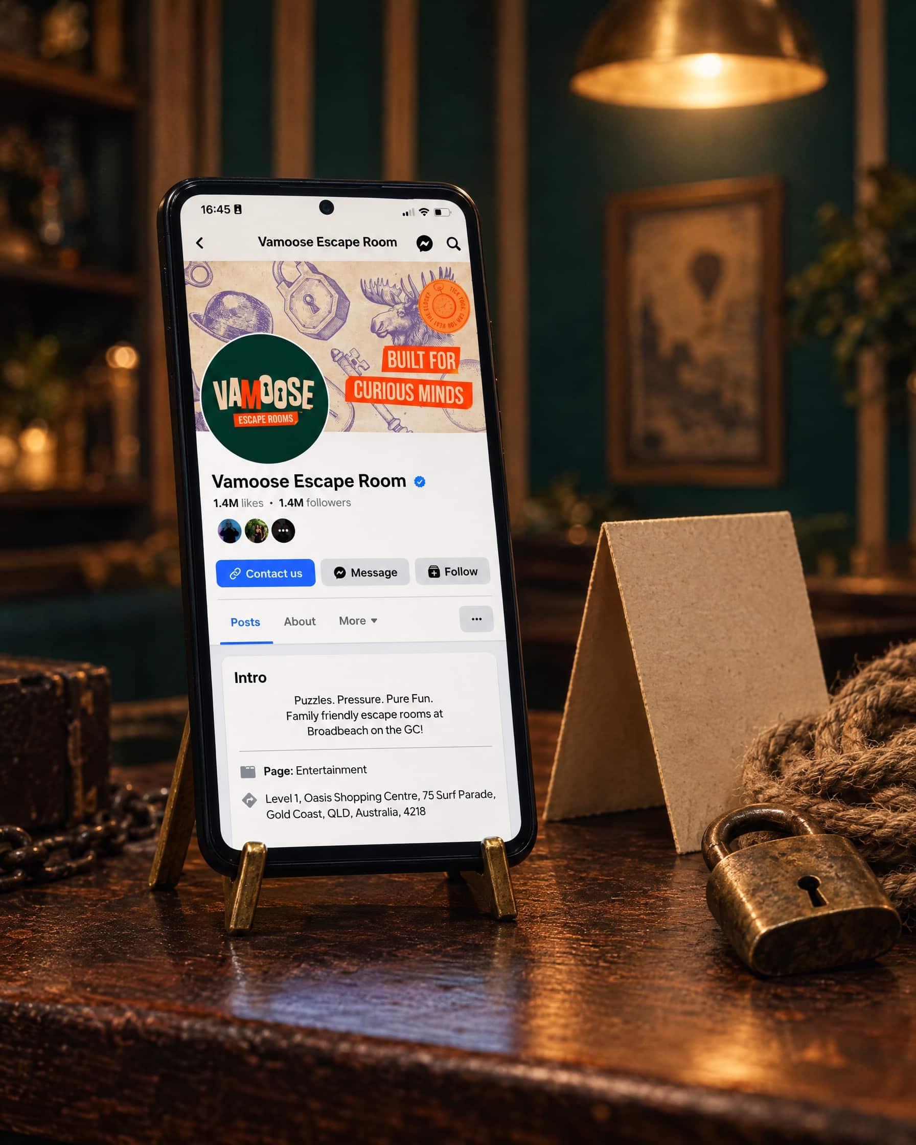 Vamoose Escape Rooms Facebook Page On Phone Mockup
