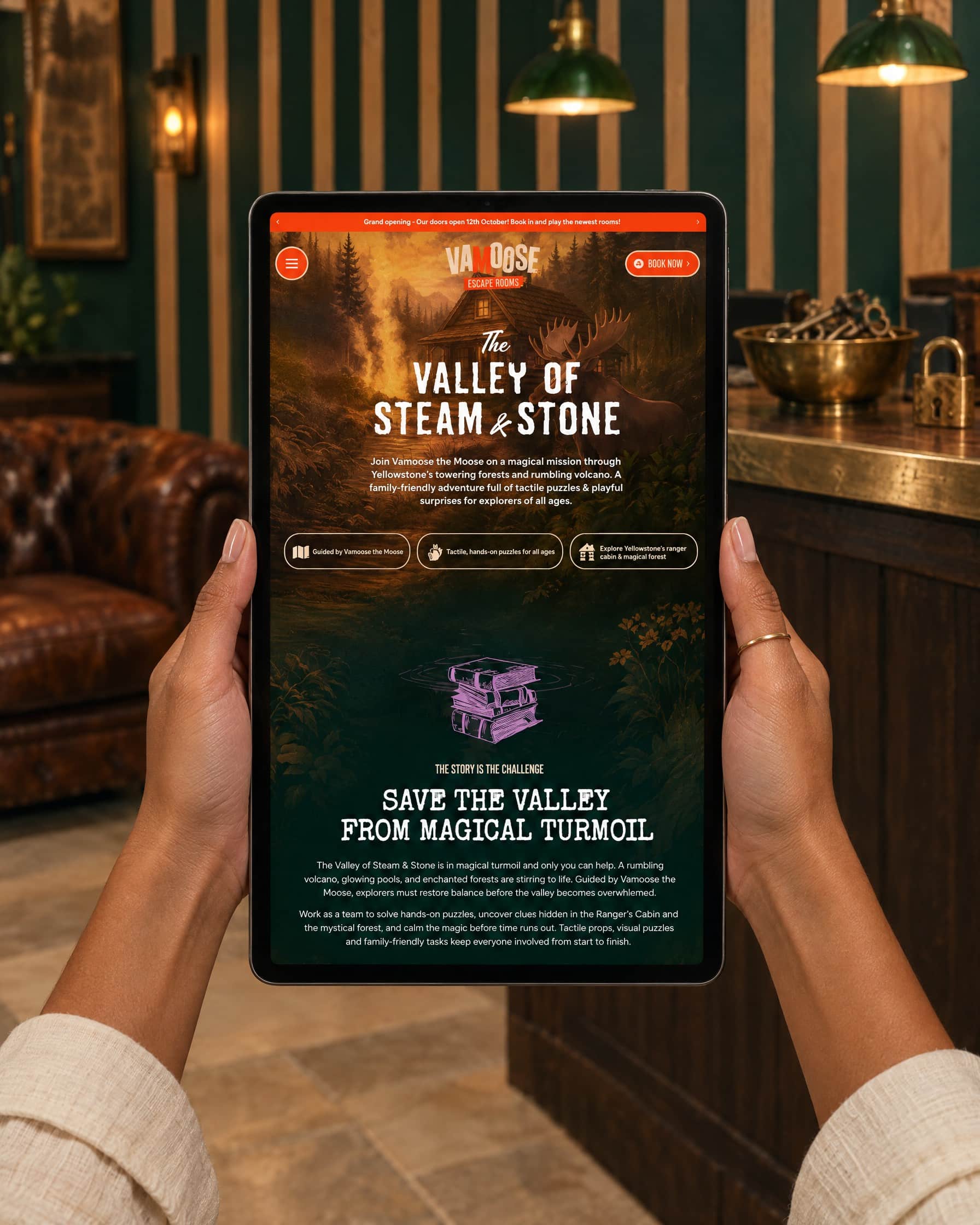 Vamoose Escape Rooms Website Valley Room Page Tablet In Hands Mockup